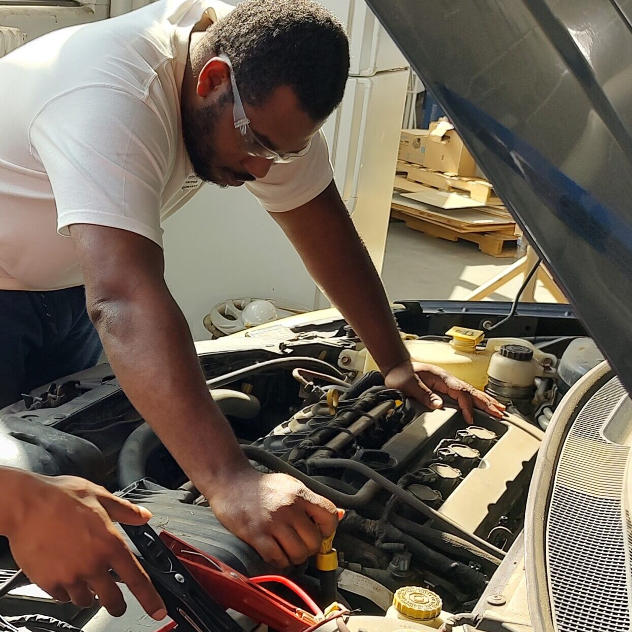 Mechanic student in free class learning for career