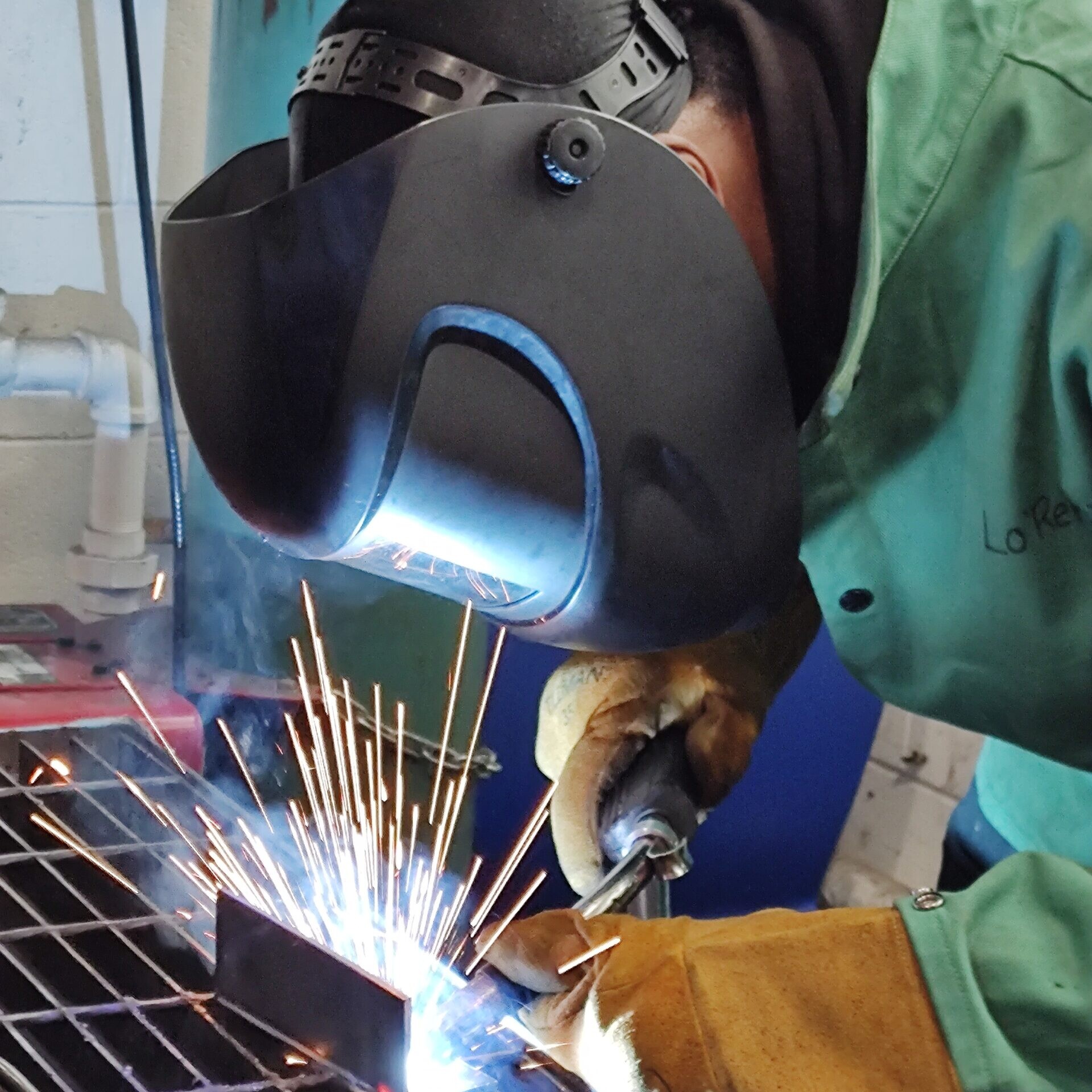 Student welding to build career skills